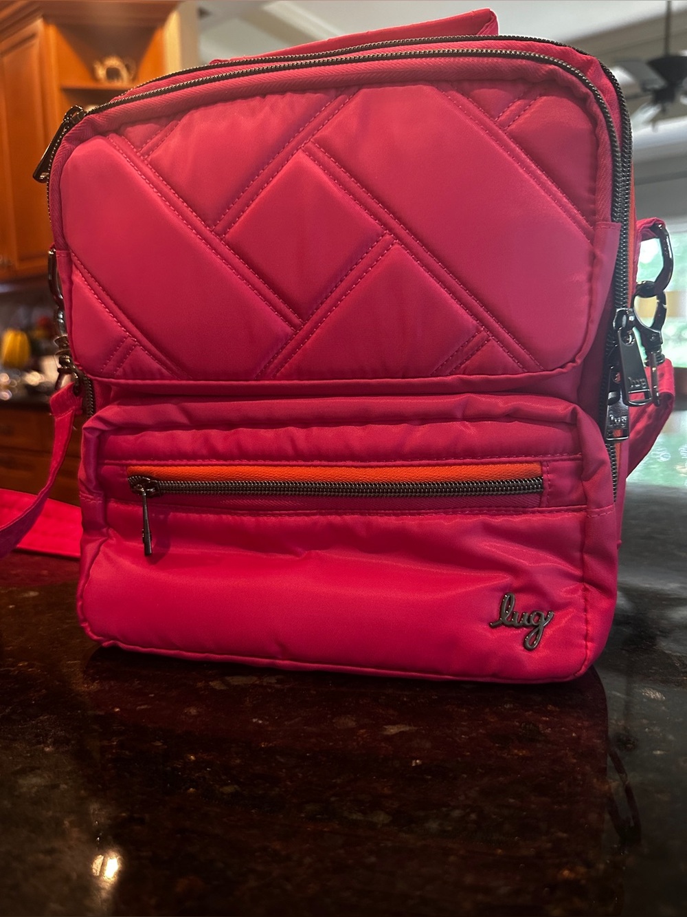 LUG Quilted Crossbody Bag in Vibrant Pink